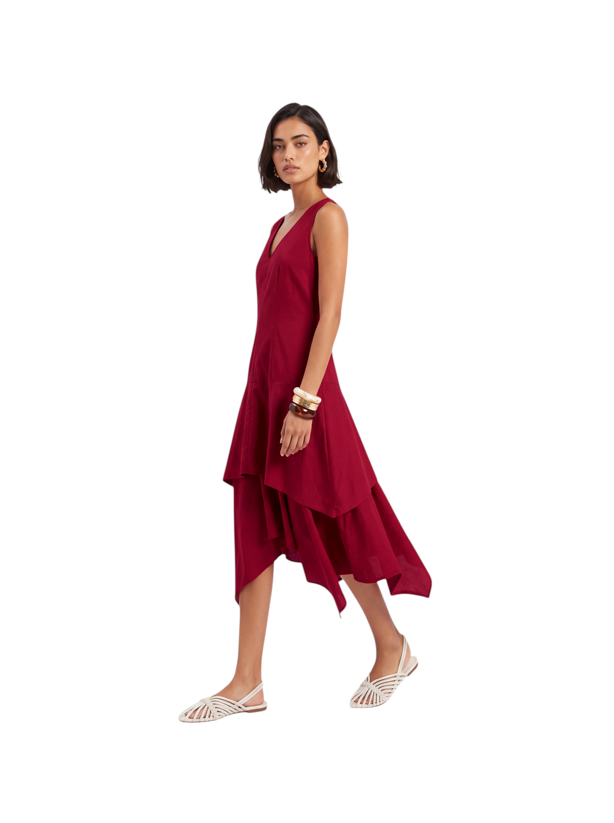Model wearing a red K/Woods Solstice sleeveless dress with a keyhole neckline and handkerchief hem from Metro Singapore Departmental Store - Celebrating 69 Years in SG