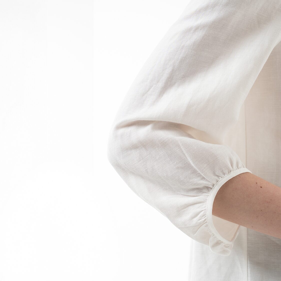 K/Woods Modern Folk Peplum Top in Off White