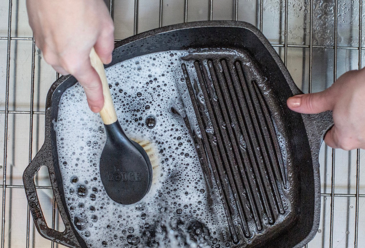 Lodge 10.25inch Seasoned Cast Iron Skillet + 8inch Cast Iron Antler Trivet + 10inch Scrub Brush + Scraper Set